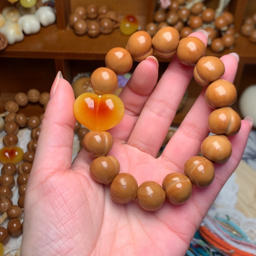 吊坠猴头核桃新款屁桃手串爱心