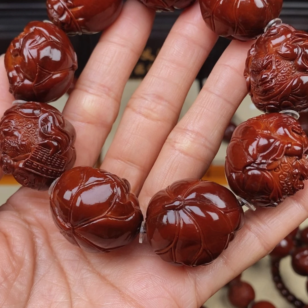 ****子橄榄核吊坠龙财神