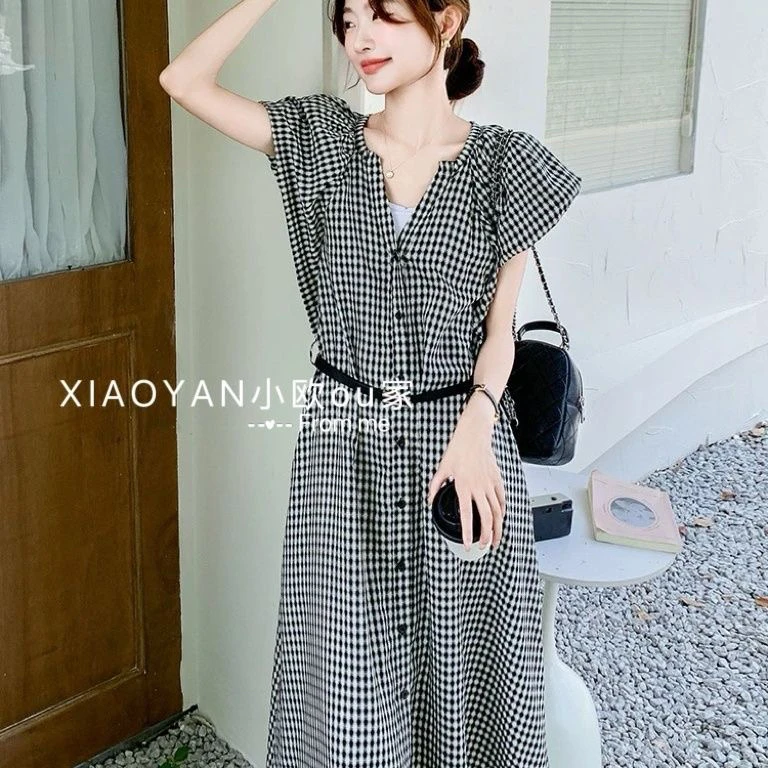 法式黑白泡泡气质格子连衣裙夏季设计2025收腰新款显瘦长裙