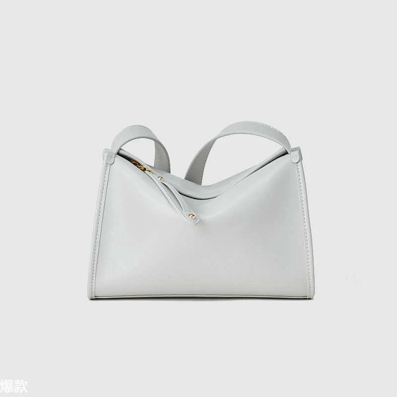 今年新款植鞣牛皮邮差包大容量休闲通勤包复古轻奢单肩包斜跨包