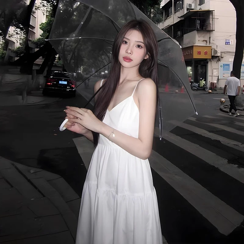 法式白色V领吊带连衣裙子女装2025夏季新款海边度假收腰蛋糕长裙
