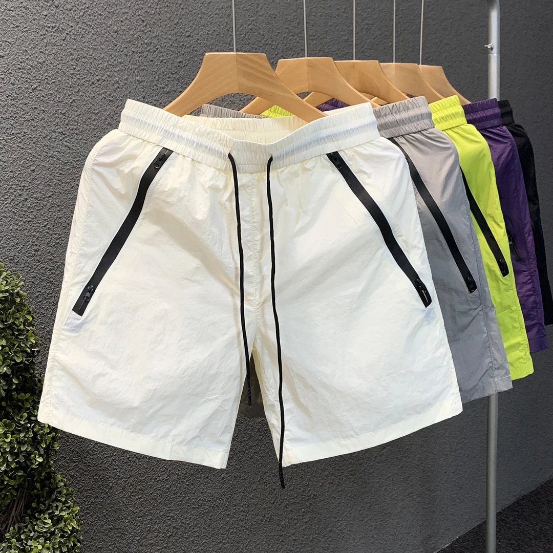 夏季百搭简约男士短裤宽松时尚百搭大口袋工装风男款大号短裤