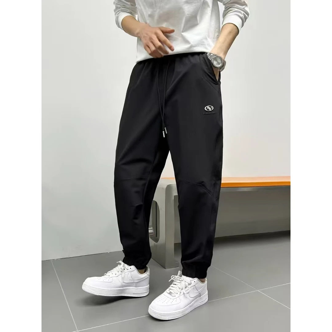 18-138潮透气卫裤刺绣夏季百搭速干裤休闲裤宽松弹力耐磨男裤