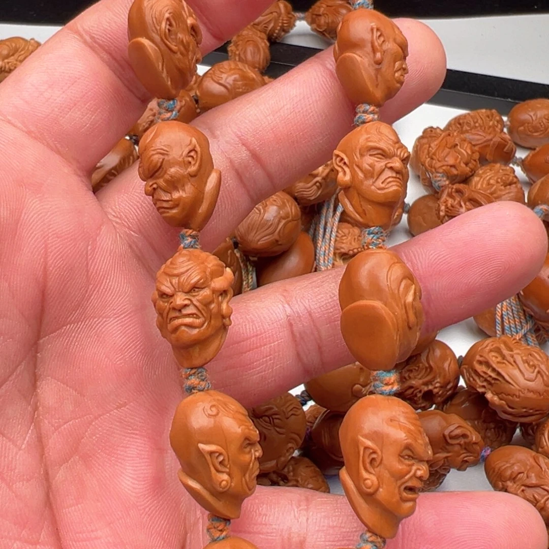 橄榄核吊坠十二尊者