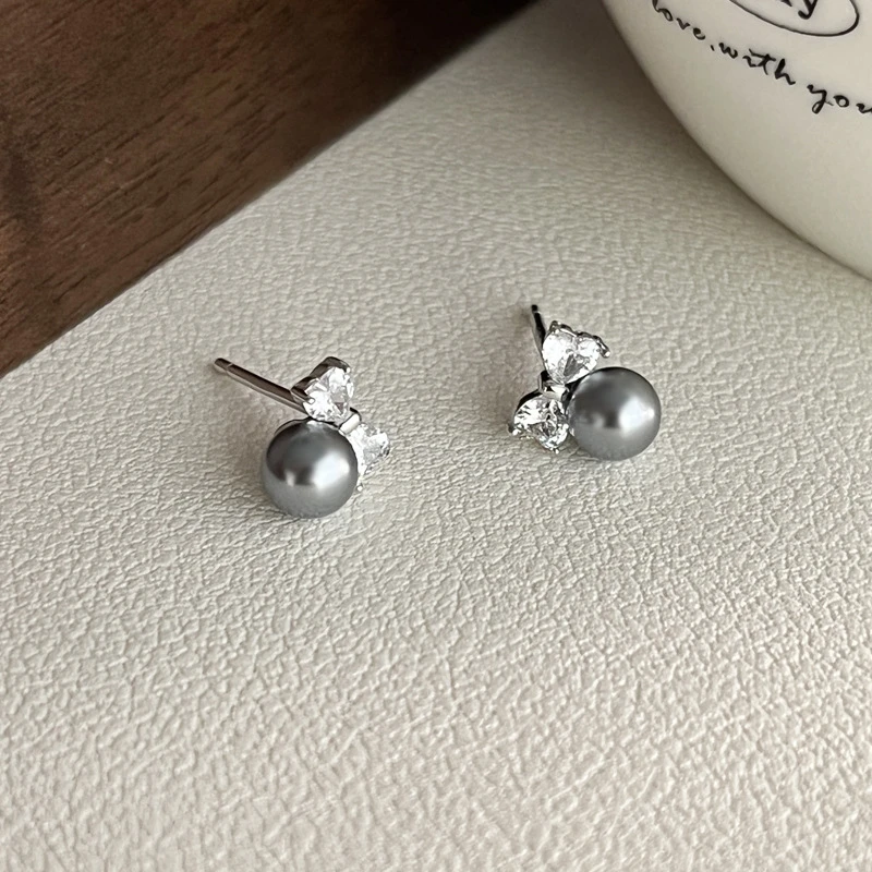 925银仿珍珠耳饰 925纯银蝴蝶结锆石珠珠耳钉女简约超仙甜美少女