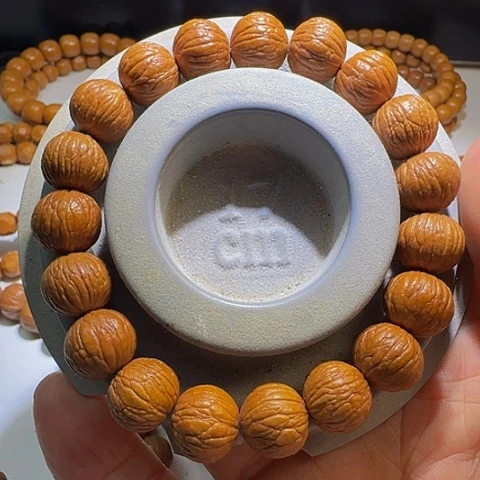 猴头核桃手串原生态无修凤羽