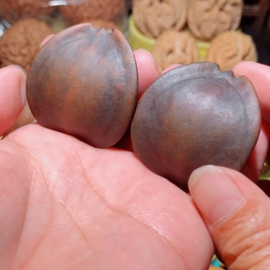 文玩核桃把件菠***?七彩地焖橄榄