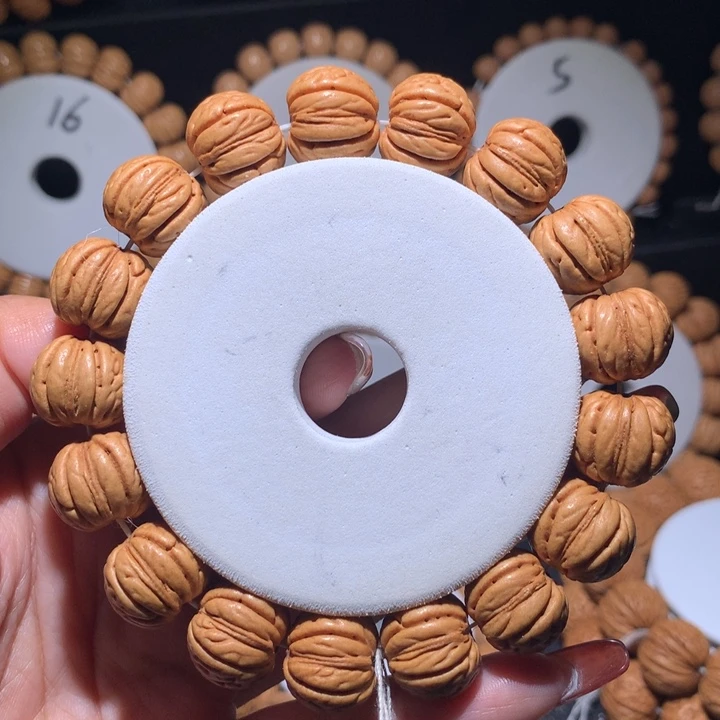 手串桃核头货金丹