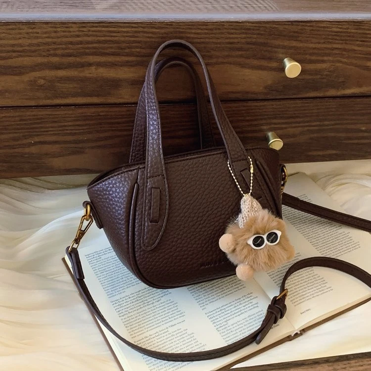 轻奢复古小众手提包包时尚百搭水桶包女士休闲斜跨小包包单肩质感