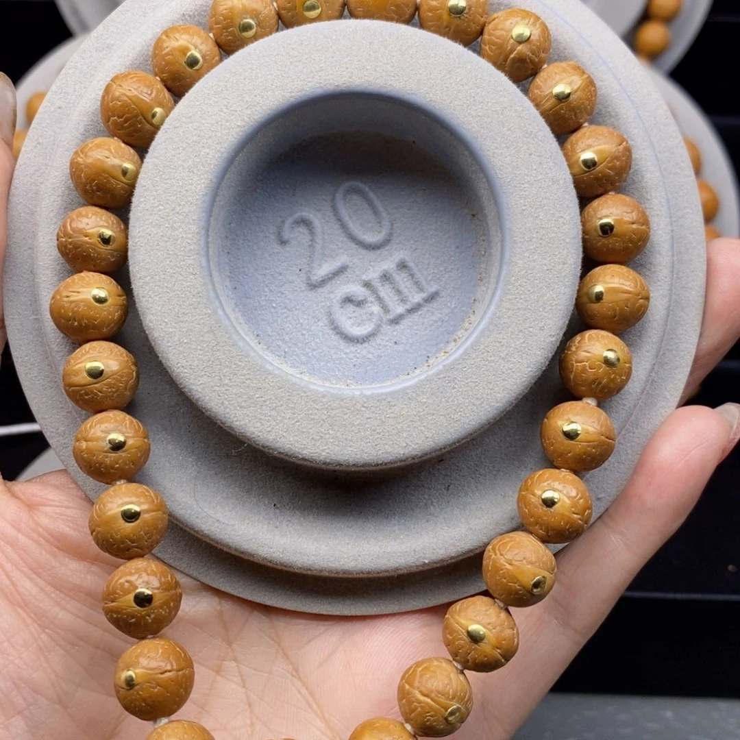 精品凤眼菩提10.5mm新籽镶嵌铜松手持