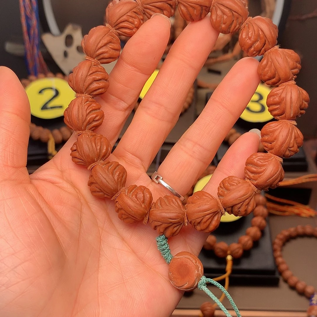 桃核手串欢**你野生红魔17