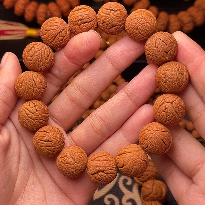 手串桃核金丝龙珠1.7