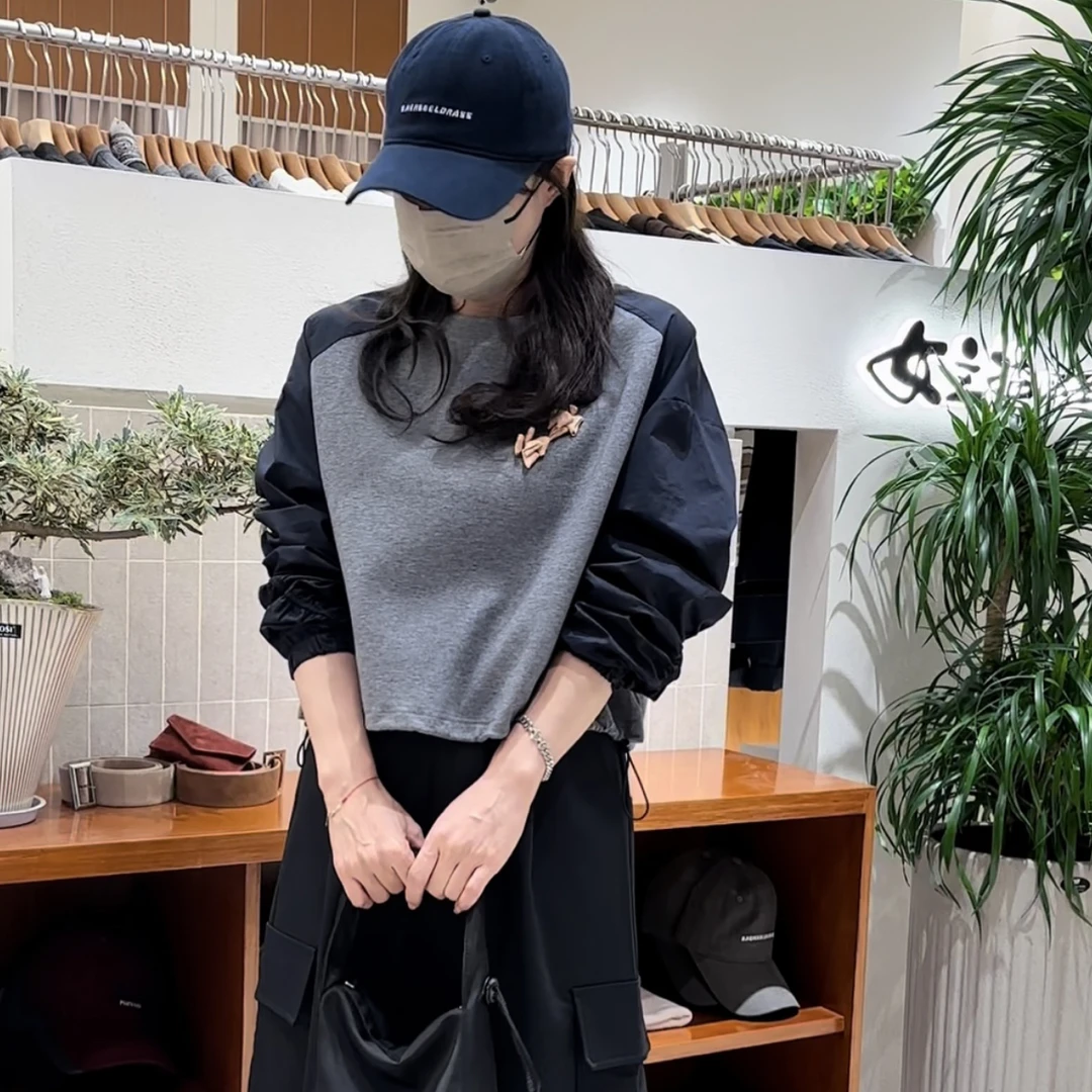NZB 秋装新品拼袖花朵图案圆领卫衣