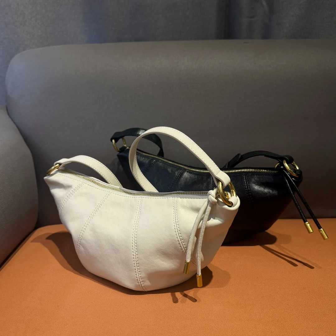 Snowly雪米莉牛角包月牙包韩版时尚百搭牛皮复古单肩包斜挎包