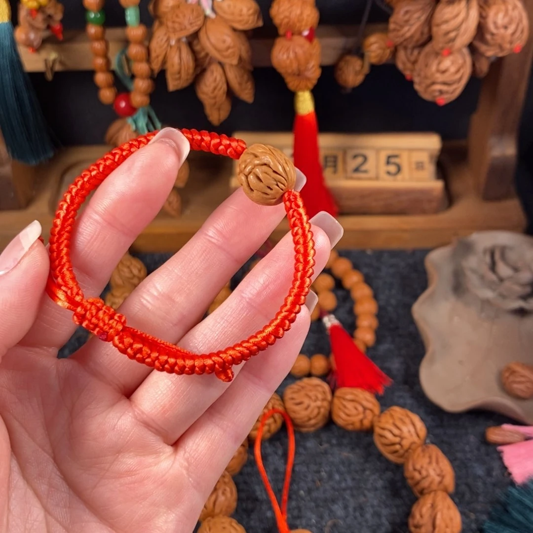 吊坠桃核桃枭手串