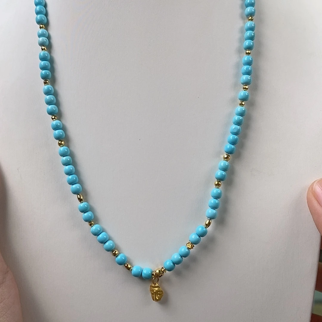 观***尔绿松石18K金镶嵌珠宝奇石