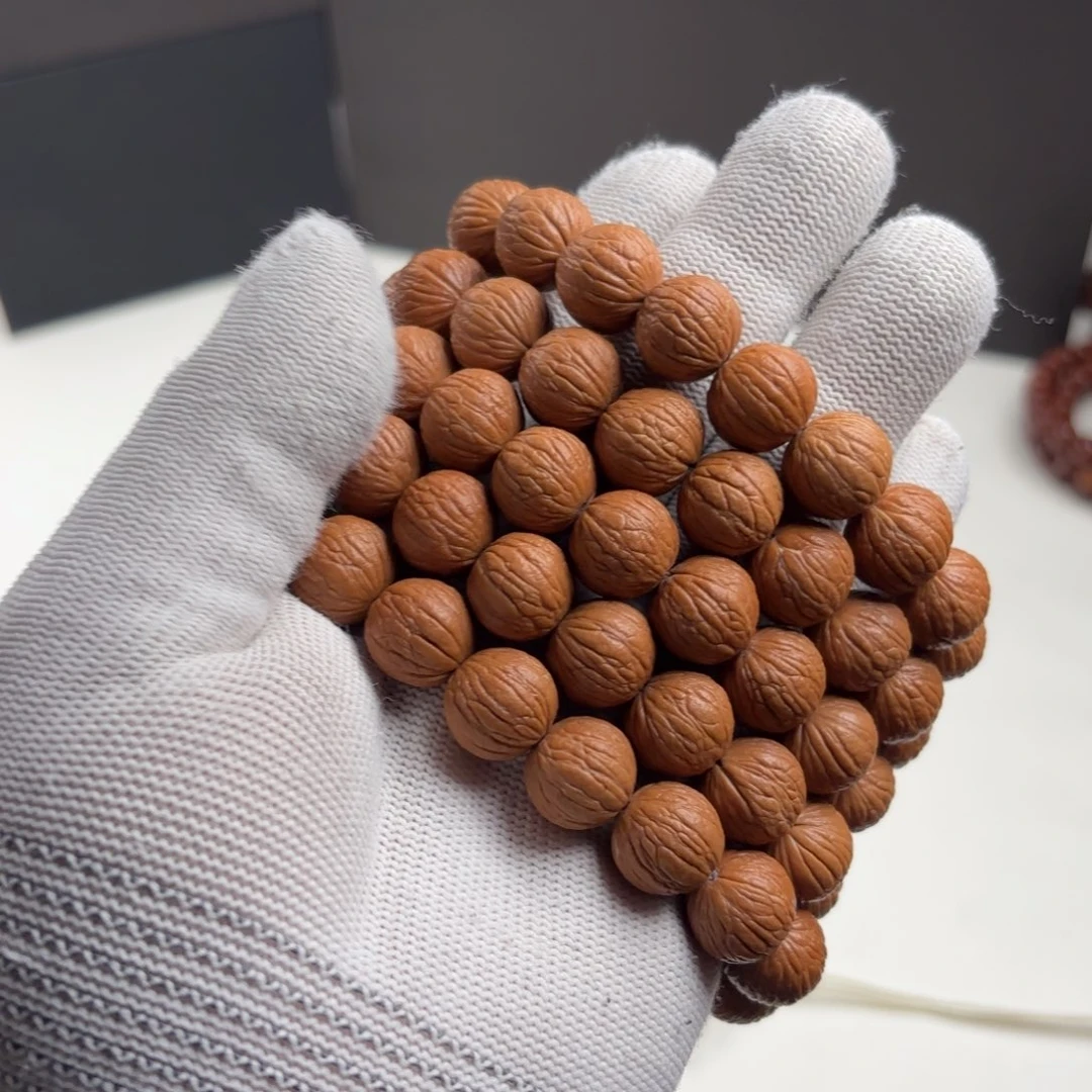 猴头核桃手串凤羽，