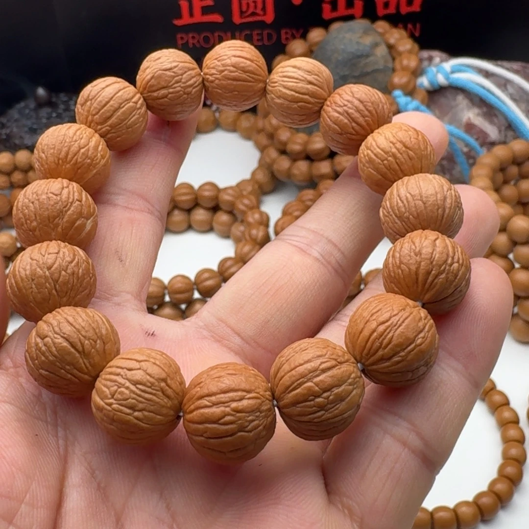 东***风手串猴头核桃原皮原色凤羽不同尺