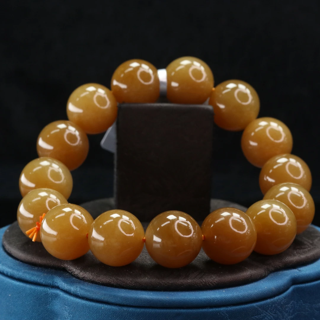 27和田玉且末满糖手串/600509北京中保拍卖