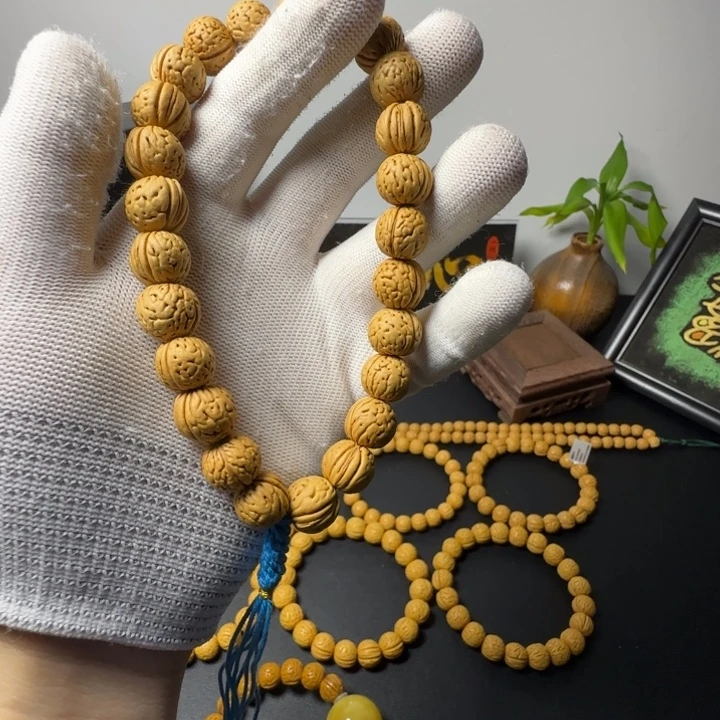 劉***生桃核手串野生桃核福利不退换