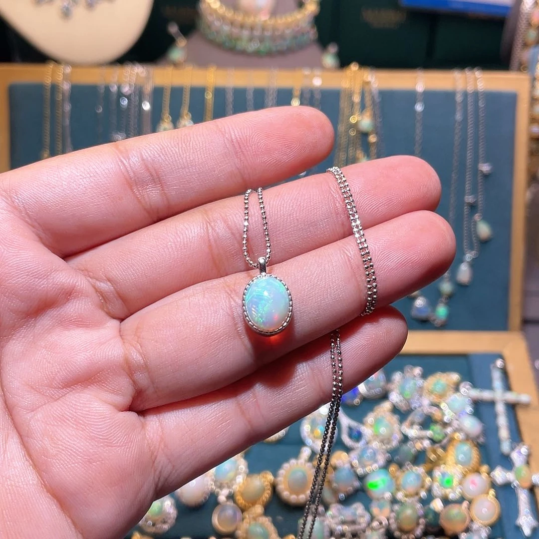 银S925镶嵌欧泊吊坠）古***咕