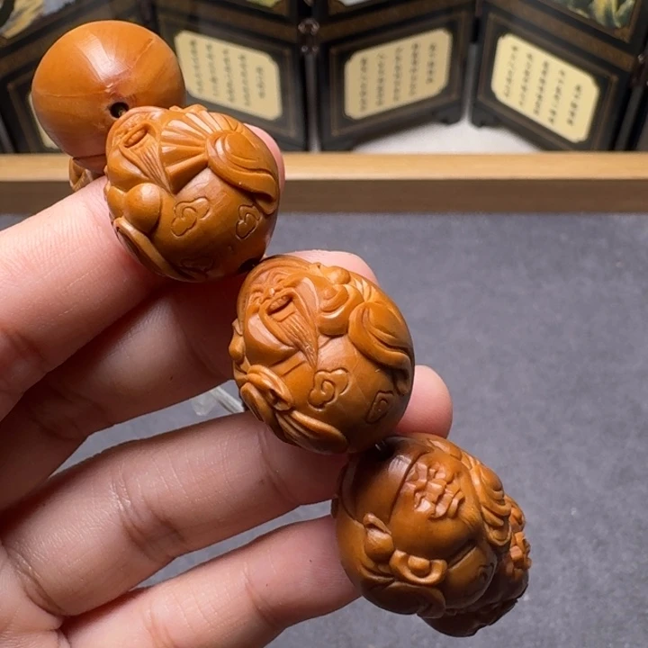 姜****手串/手链橄榄核光背财神
