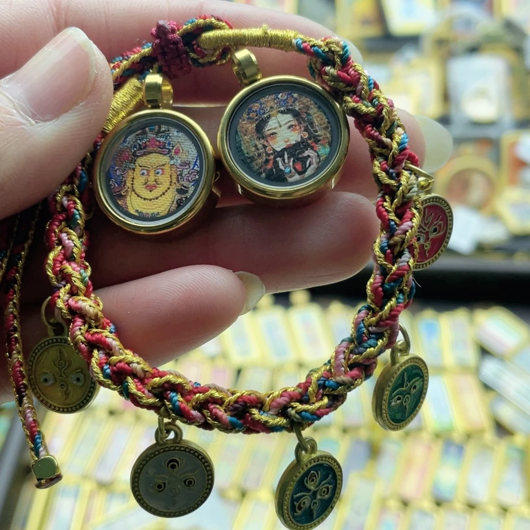 燃***火铜铁合金类唐卡等多种形式进行了介绍和