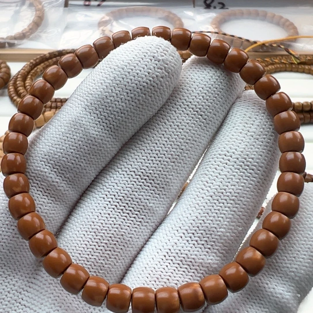 橄榄核手串星***河5.9核尖手串面三花