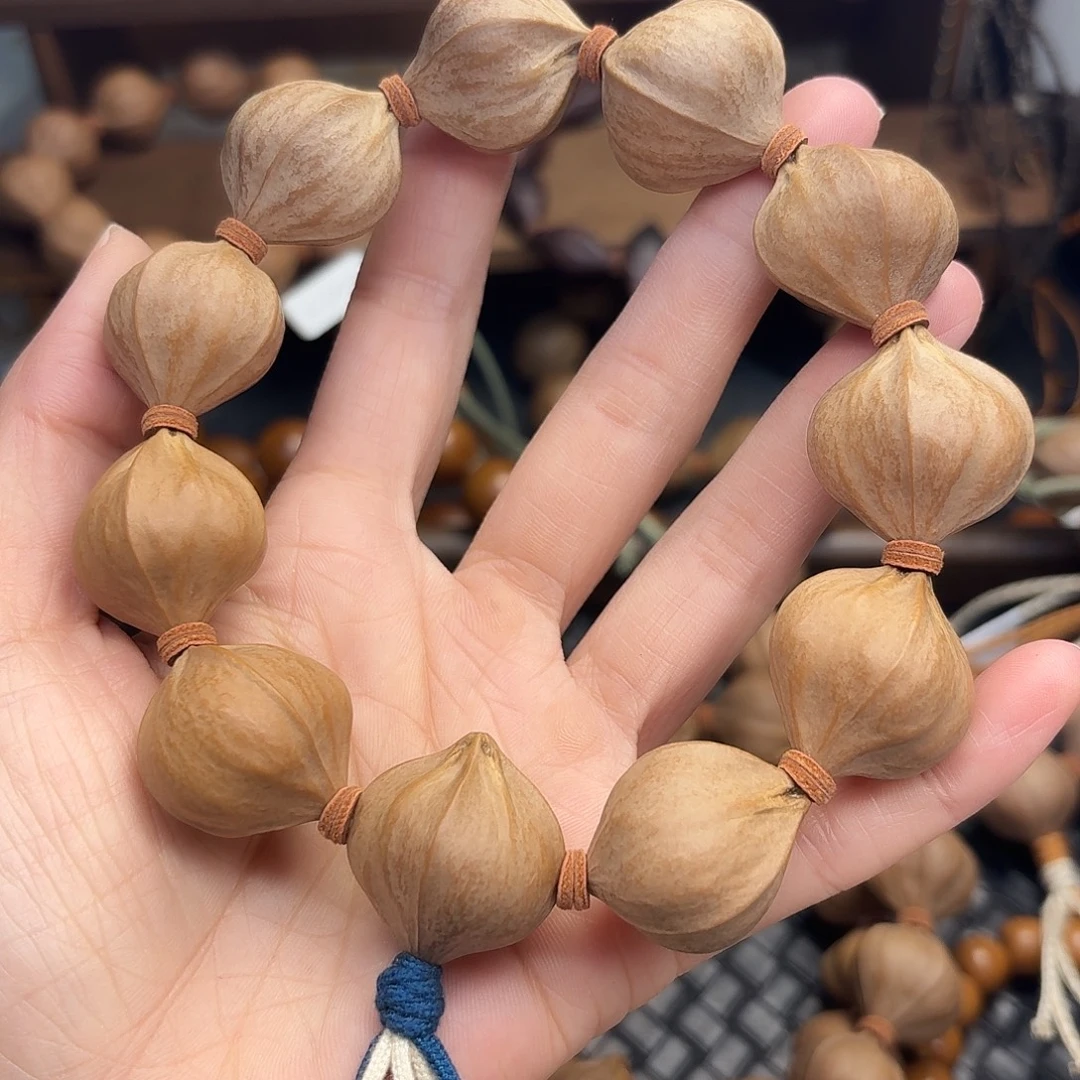 手串橄榄核02。2.4*2.6四花