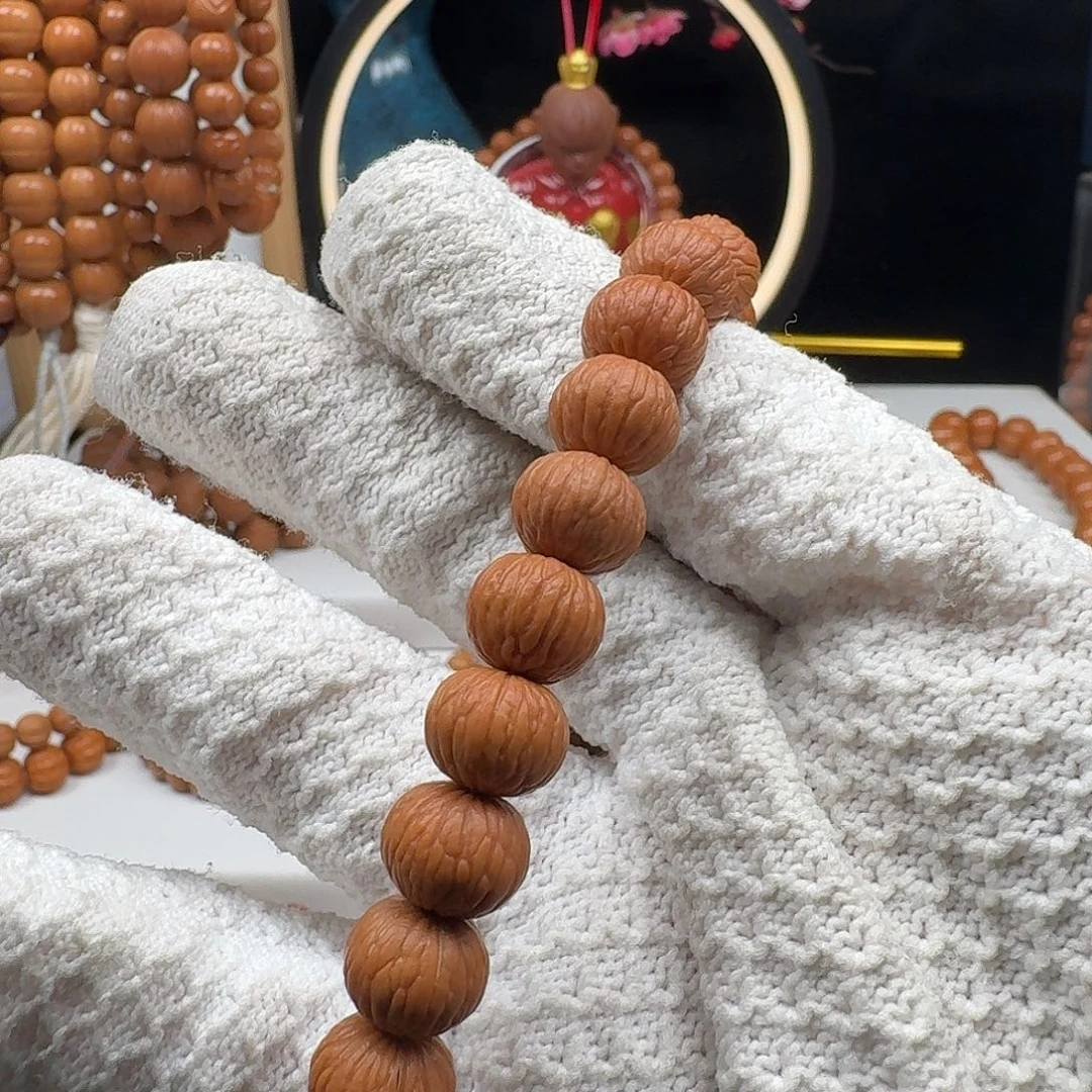 笑***生猴头核桃手串猴头凤羽11