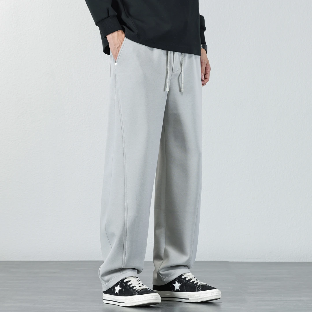 简约抽绳松紧腰休闲裤子男秋冬季宽松复古卫裤直筒弹力拼接长裤潮