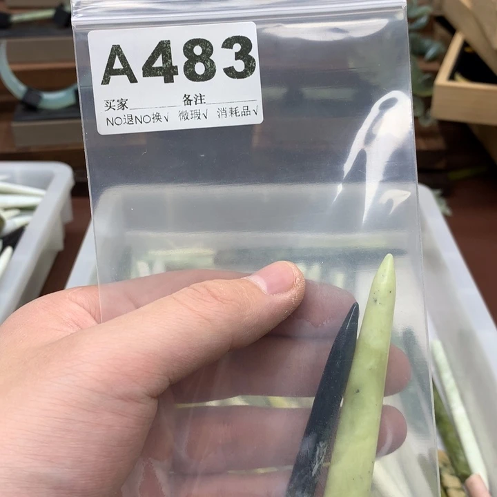 蛇纹石玉发饰合金钱**?