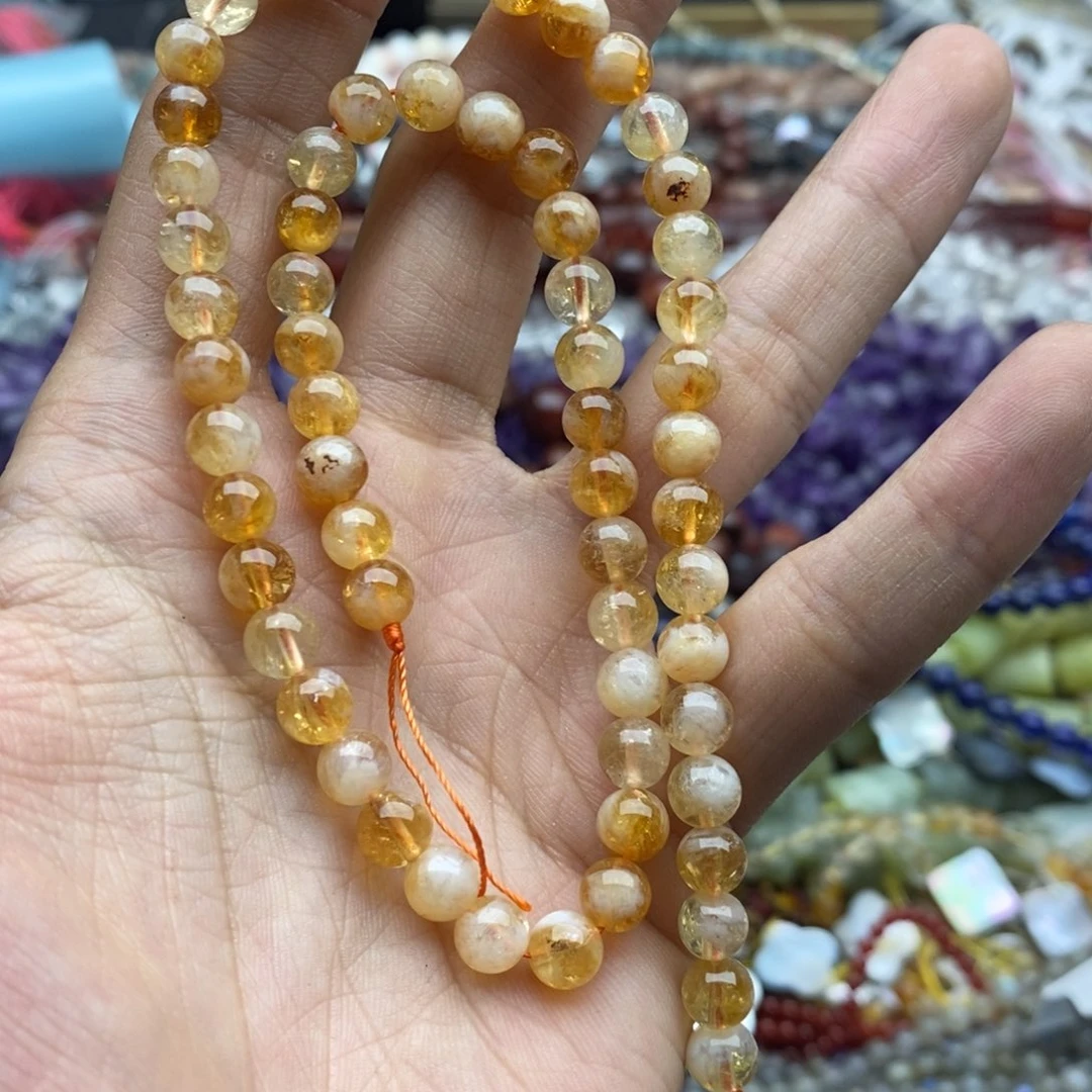 玛瑙/玉髓未镶嵌珠宝半成品一条天然6.6mm黄塔晶圆珠