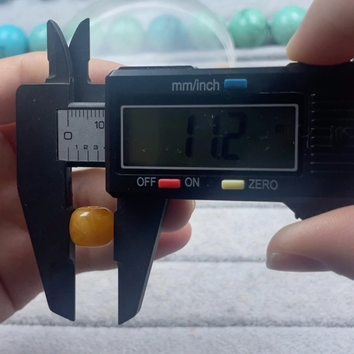 蜜蜡裸石未镶嵌天然蜜蜡老型11*9mm尺寸单颗妖花款微瑕