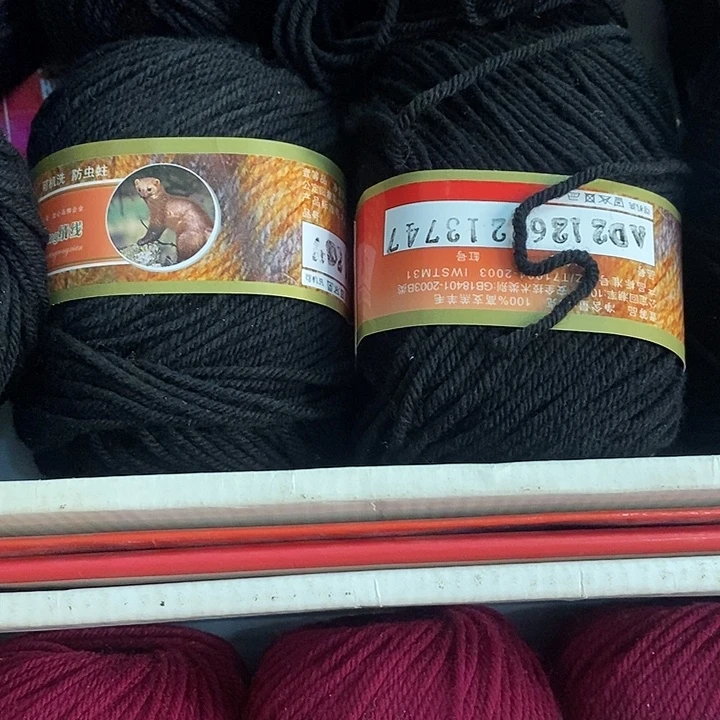 董***花羊毛貂绒黑红1.4斤价格