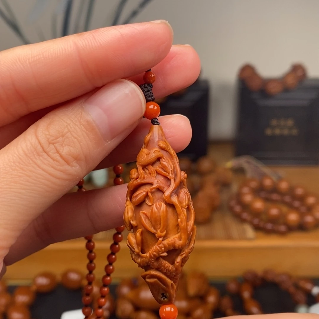 吊坠橄榄核许忠英老师玉兰花