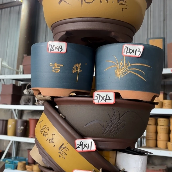 紫砂花盆100-6。