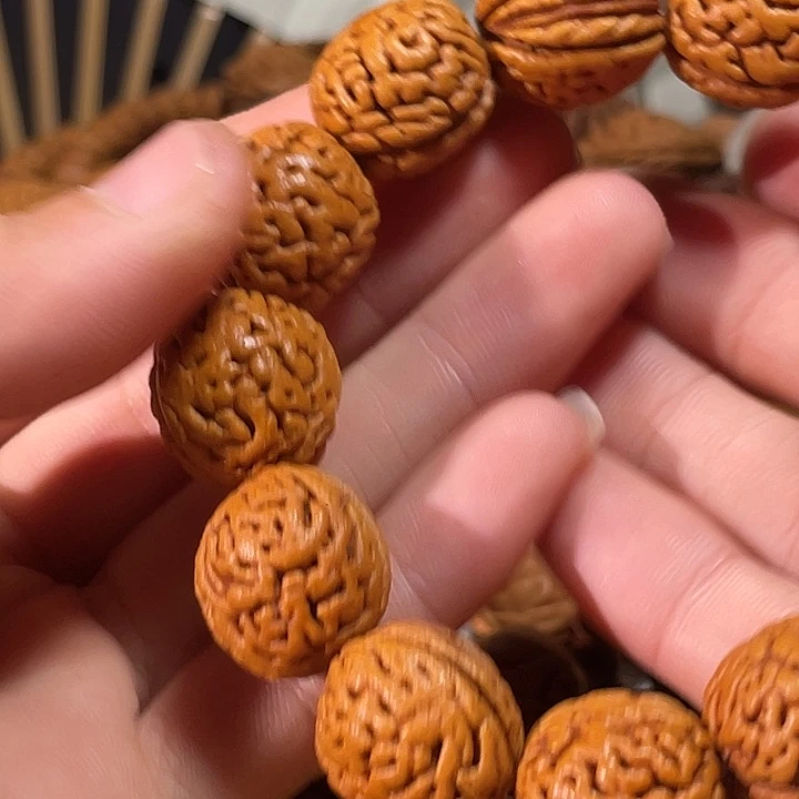 飞***鱼桃核大尺寸手串钱袋