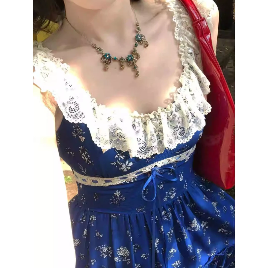 蓝色露背碎花吊带连衣裙女夏季海边度假风长裙设计感收腰显瘦裙子