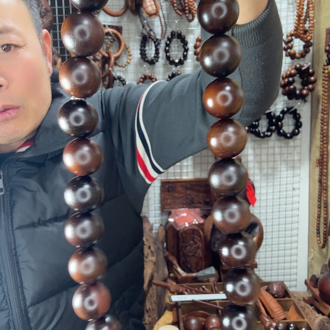 芦***园百年雷击枣木玉化手持