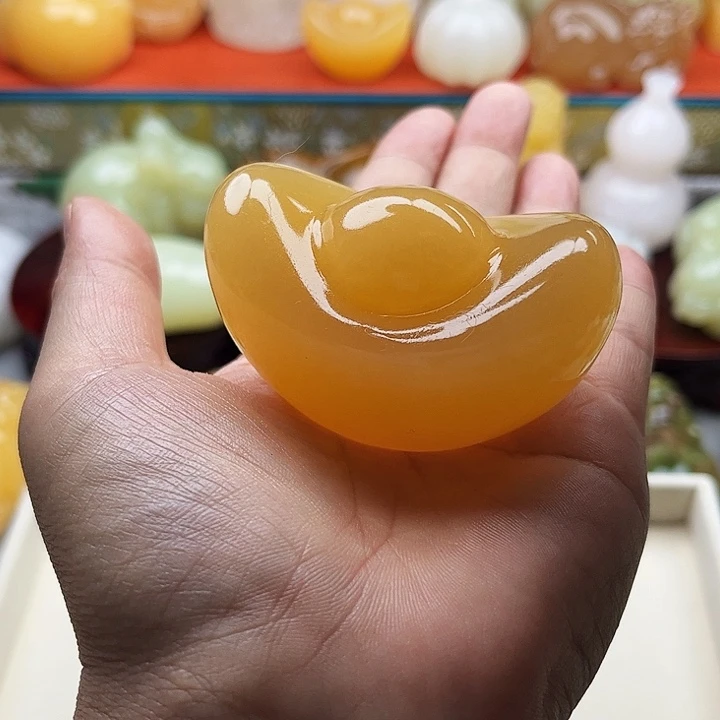 用***7石材元宝手把摆件