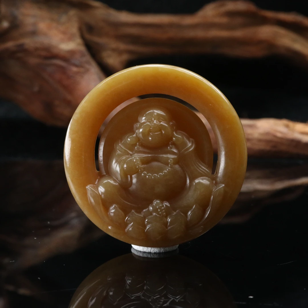 17和田玉且末金糖佛公/300112北京中保拍卖