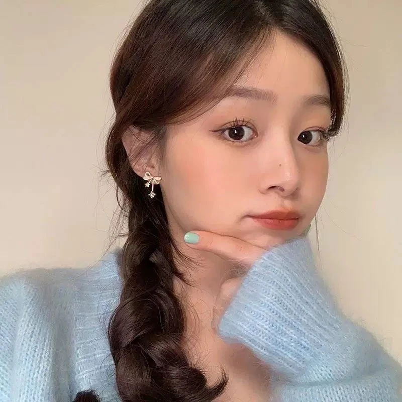 【381】约白色蝴蝶结不对称耳环新款潮时尚感气质网红S925银针耳