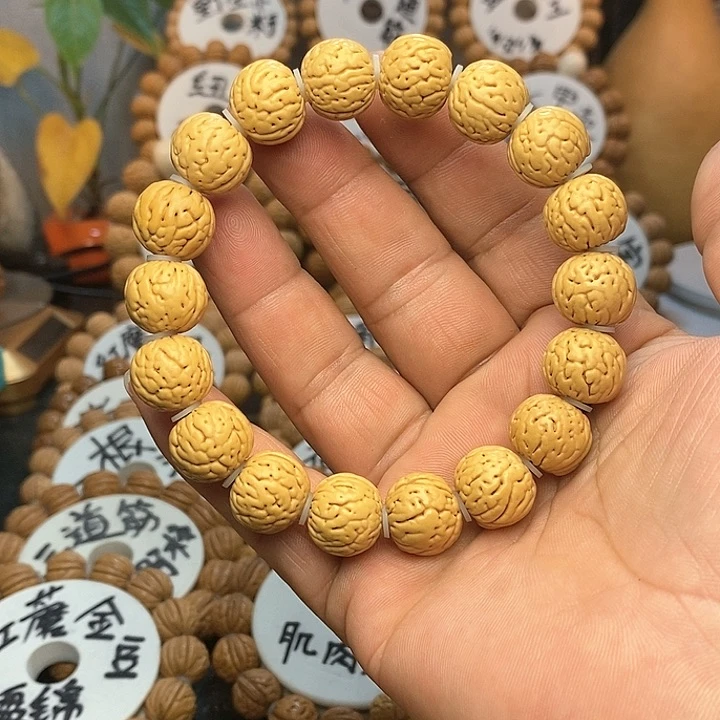 【闪购商品】u****7桃核手串金丹手串