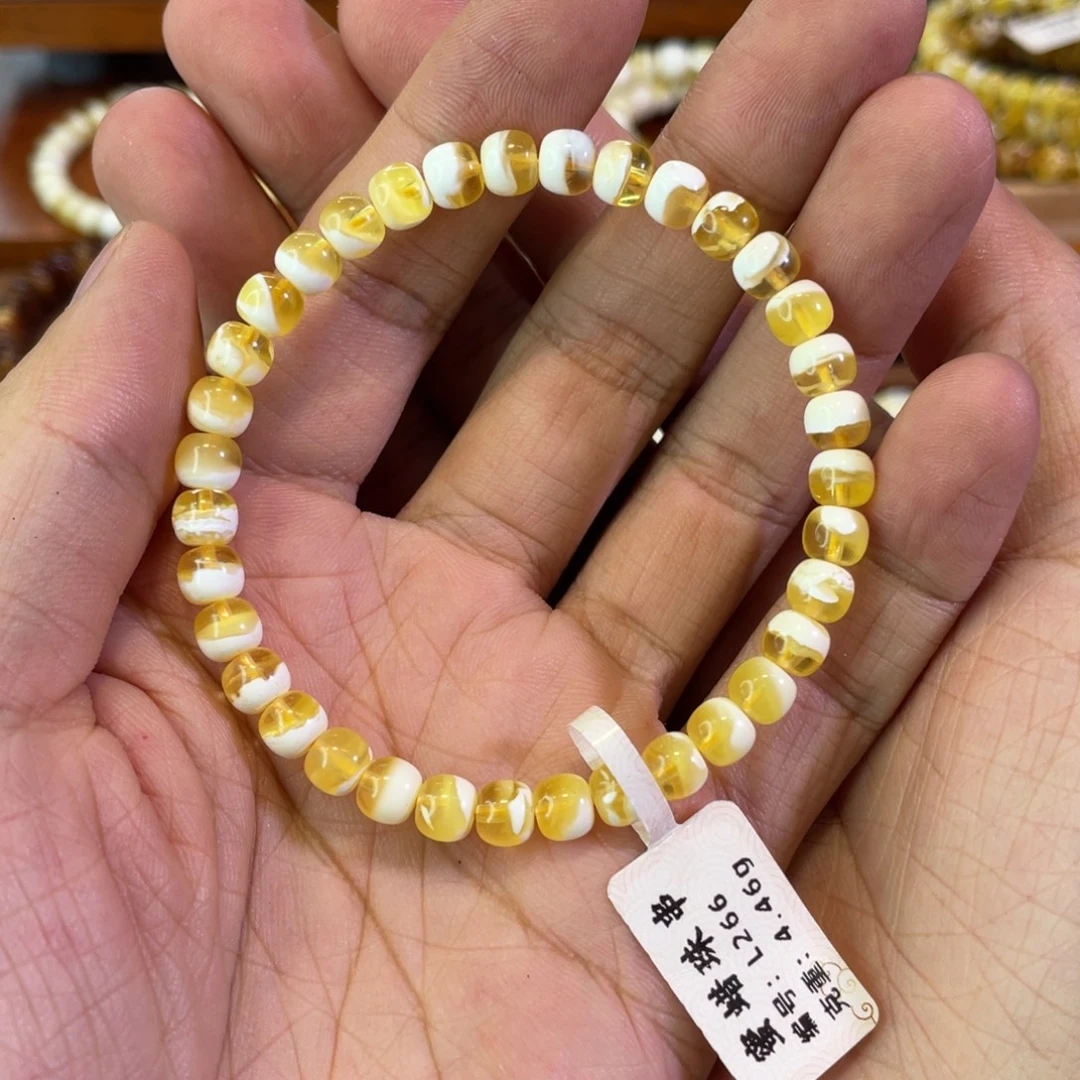琥珀未镶嵌裸石聚宝盆老型手串