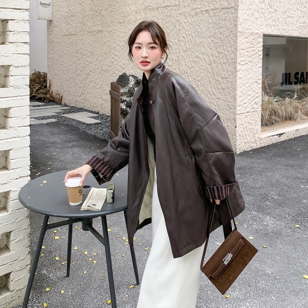 条纹拼接PU皮羽绒服女冬季2025新款轻熟风中长款90白鸭绒保暖皮衣