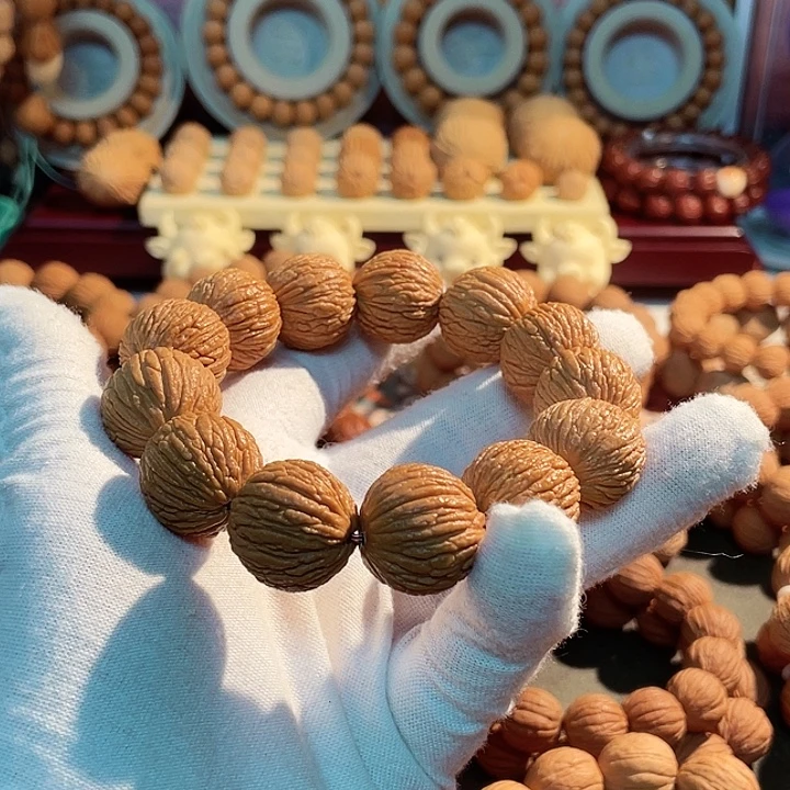 沈***司手串猴头核桃野生大凤羽