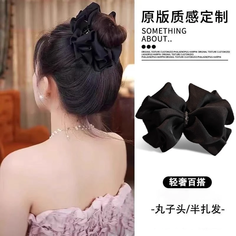 气质黑色蝴蝶结丸子头抓夹女2025新款高级感马尾夹显发量半扎发夹