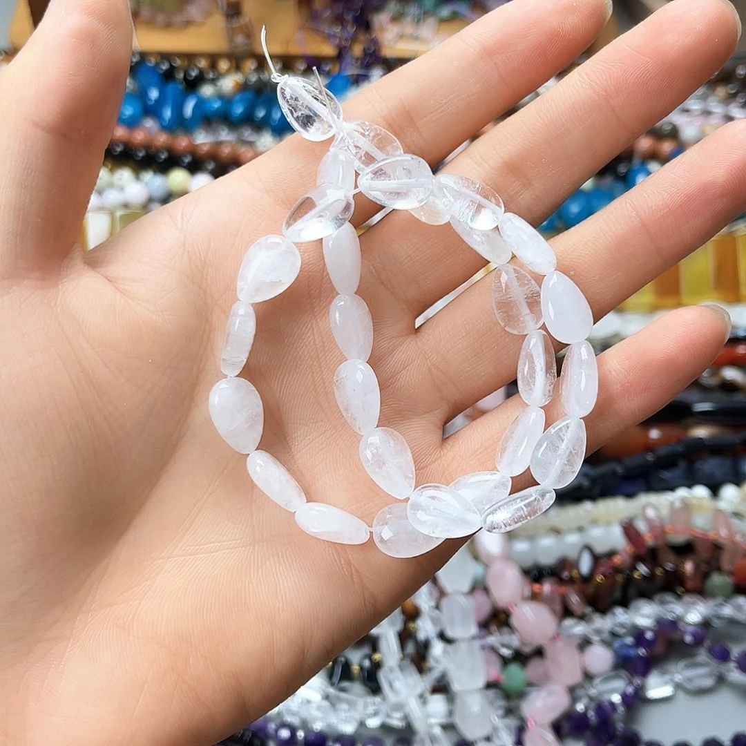 玛瑙/玉髓未镶嵌珠宝半成品9.5×13白水晶扁水滴一条