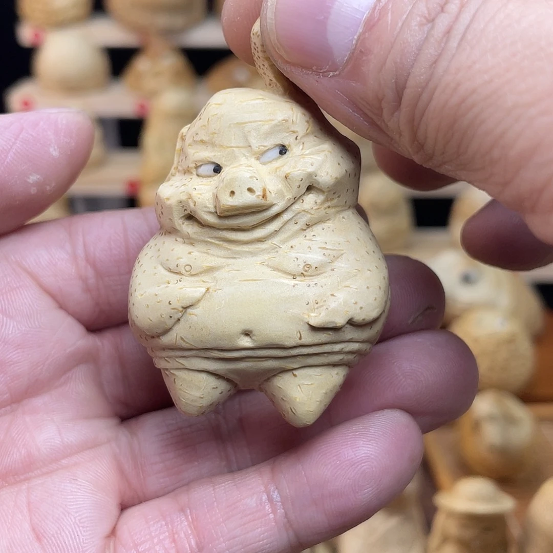 竹竹根雕小猪手把件